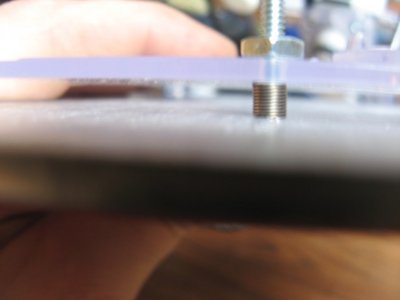 IMG_6213.JPG (48.3 KiB) Viewed 18953 times Here is the spring setup, I will release them a bit. But the whole shebang is only .475 thick with them released a bit.<br />I used 6/32x1 countersunk screws and the heads are epoxied into the AL plate.<br />The height is not an issue as I gained travel by changing out the bent all threads, still more than stock H1