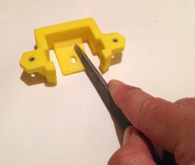 File away the residual support material.