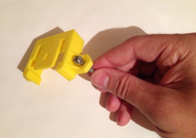 rostock-max-v2-tensioner-installing-nuts-v25.jpg (277.2 KiB) Viewed 19045 times Installing nuts into top bracket. Use a screw to help press it in place.