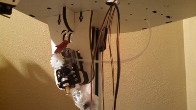 This is the better direction to send the filament because, it's stiff, and rather take a long turn, than a short turn, if you want it to avoid snagging or hanging up.
