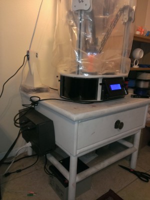 Here's my current setup.  I took an APC UPS that I had lying around and hacked it to take a 12v scooter deep cycle battery :)