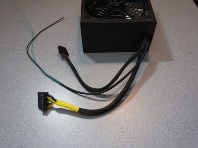 Replaced Power Supply with beefier unit and removed unused wiring harnesses before installation.